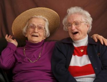 Two senior ladies laughing